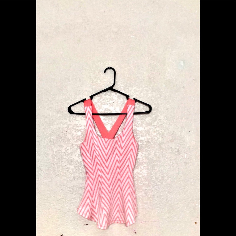 A pink and white striped shirt white a pink